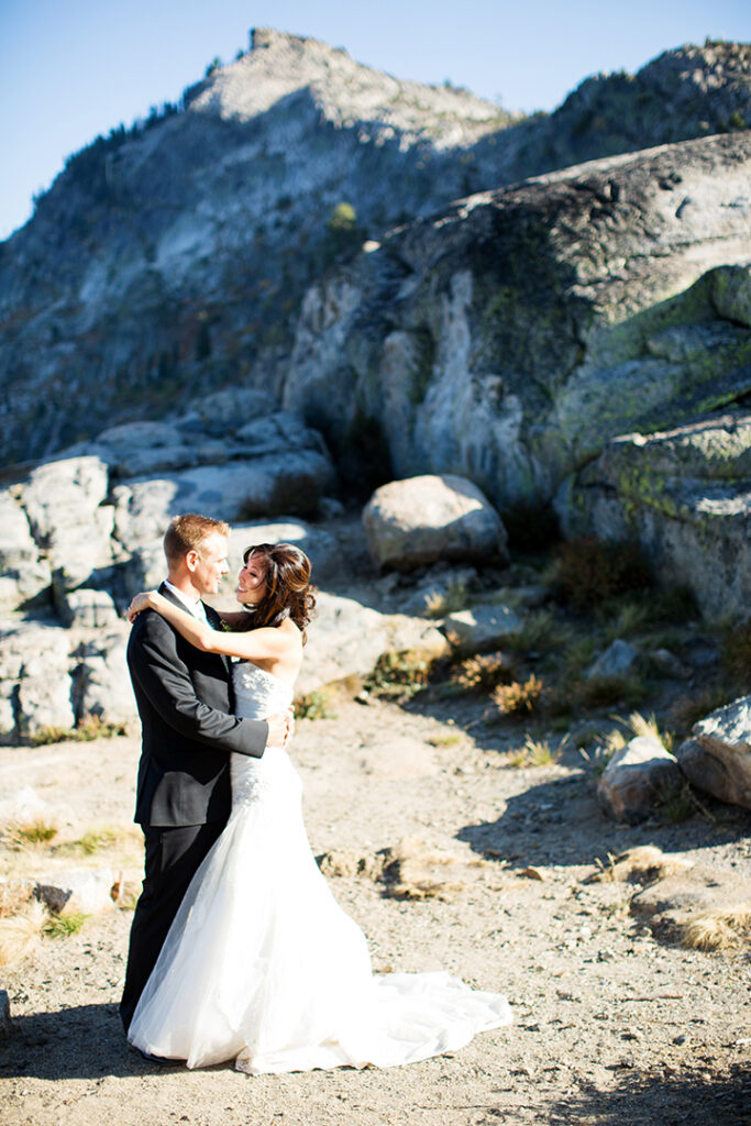 A newlywed couple posing on Donner Summit